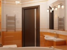 Salle de bains orange avec miroir