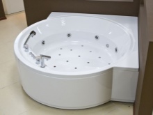 Round acrylic corner bathtub